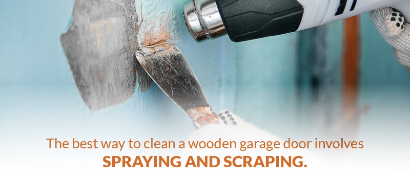 Cleaning a wooden garage door often requires spraying and scraping